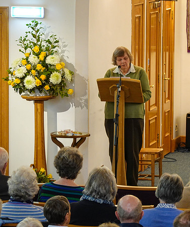 Ann reading at church