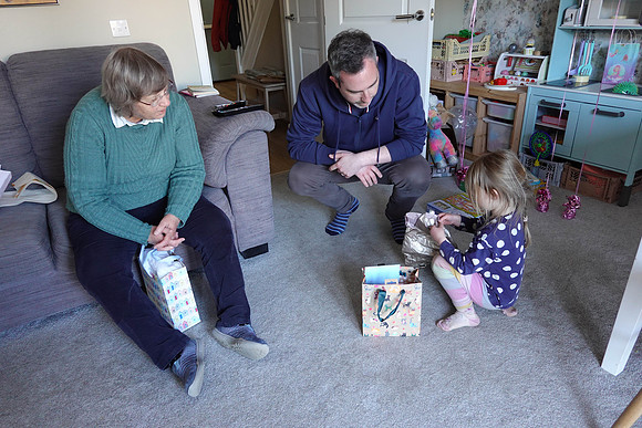 Norak=h opening her birthday presents